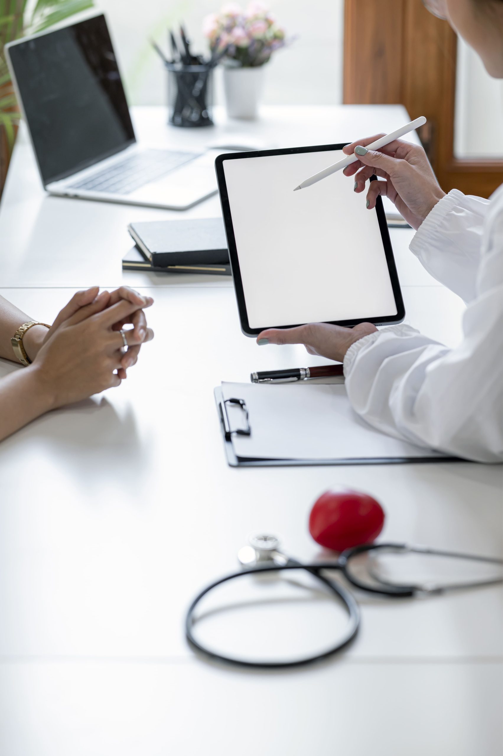 medical-consultation-using-tablet-in-a-doctor-s-of-2026-03-16-02-33-30-utc (1)