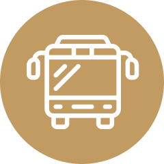 An outline illustration of a bus on a circular background.