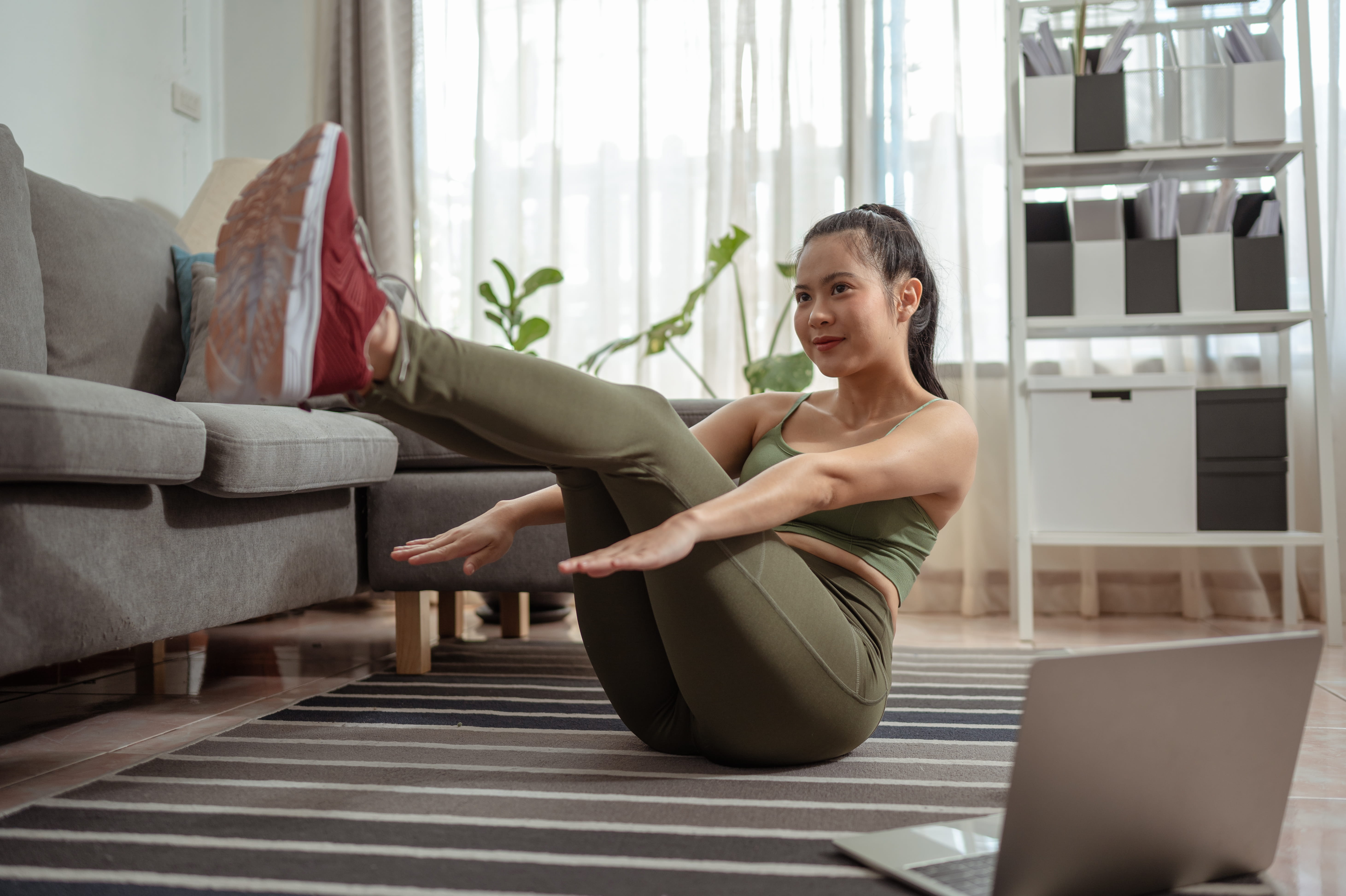 woman-doing-abs-exercise-at-home-2026-01-07-02-11-51-utc (1)