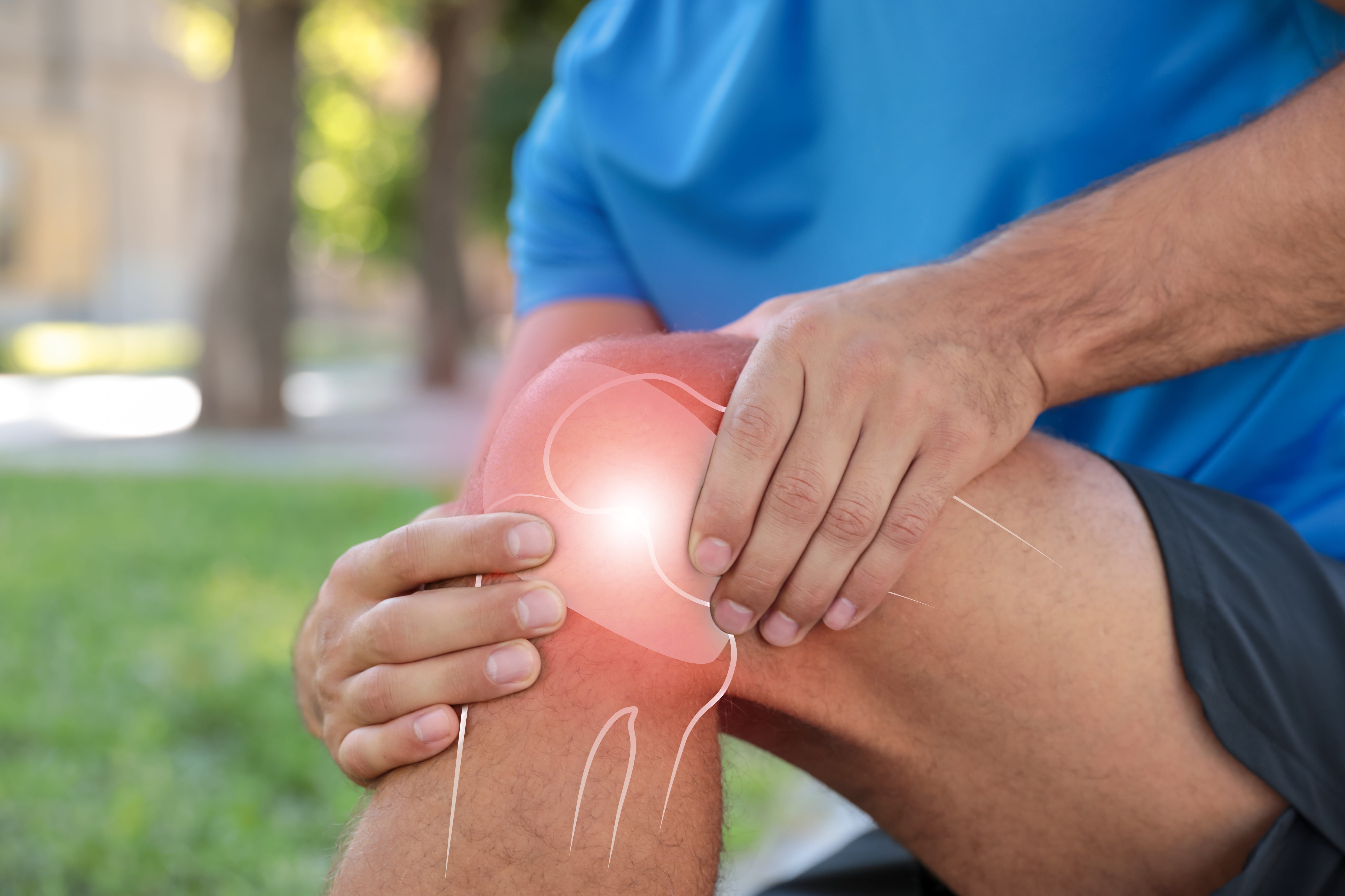 man-suffering-from-knee-pain-in-an-outdoor-park-2026-07-24-23-00-51-utc (1)